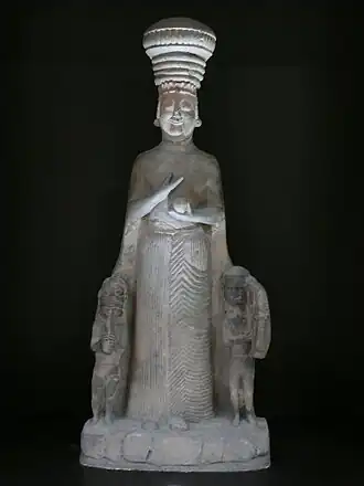 Statues of Agdistis, with two small figures in each side