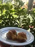 "Mussel"-shaped Midye-baklava, stuffed with walnuts