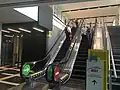 Escalators leading from Surian Link to the station