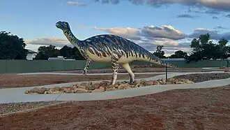 Hughenden's dinosaur statue, occupying the site of the former Grand Hotel