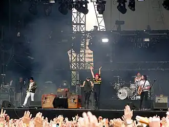 Image 121My Chemical Romance is considered one of the most influential rock groups of the 2000s and a major act in the pop-punk and emo genres, despite the band rejecting the latter label. (from 2000s in music)