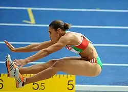 Image 29Naide Gomes in the jumping phase of the event (from Track and field)