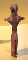 Bird-like male figurine with penis sheath.[87]