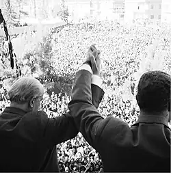 Nasser and Quwatli clasp hands
