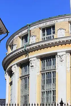 Allegorical figures on the exterior of the rotunda, National Library of Finland, with fellow sculptor Karl Magnus Mellgren [fi], 1905