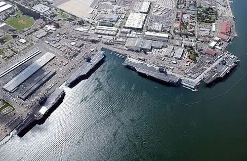 Four carriers (USS Constellation, USS Carl Vinson, USS Nimitz, USS John C. Stennis) at North Island, 2002