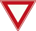 B6: Give Way sign, must give priority to other traffic on the main road ahead