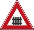J10: Level crossing with barrier or gates ahead