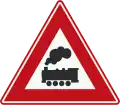 J11: Level crossing without barrier or gates ahead