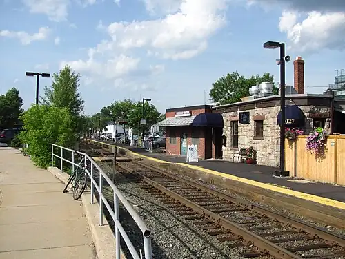 A railway station with a single low-level platform and single track