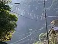 Web on electric power cable in Tanabe, Wakayama, Japan