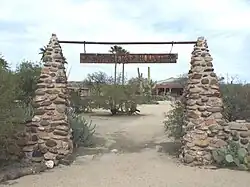 The entrance of the historic Wranglers Roost Stagecoach Stop located in 2500 West New River Road in New River, Arizona. This was where the New River stagecoach stop was located in the late 1800s. The current owners, Reid and Heidi Stewart, use the location, which was rebuilt in 1930, for weddings and as a resort.
