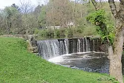 A dam across Bull Creek in the village park