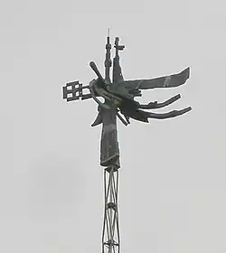 Geoffrey Clarke's winged cross sculpture that crowns the flèche