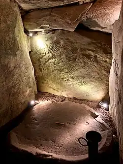 Spiral carving on stone in inner alcove