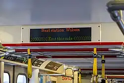 Digital multi-coloured LED signs showing the next station, these signs also show if the station offers connections to other TTC subway, light rail lines and other public transit service providers or the final station of the line along with visual arrows showing which side the doors will open on at the next stop (except final stations of the line).