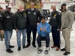 Venezuelan president Nicolás Maduro in custody of the DEA during the Operation Southern Spear.