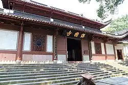 Late Qing dynasty (1644-1912) Tianwang dian of Baoguo Temple in Ningbo, Zhejiang, China. Rebuilt in 1911.