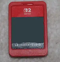 The front of a Nintendo Switch 2 game card, with the art on the card blurred
