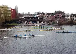 Several rowing boats upon a Dutch waterway
