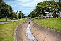 Photo of Norman Creek, Brisbane, where it was transformed into a concrete channel in the 1930s