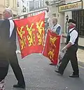 Two-leopard and three-leopard flags at a Norman language festival in Jersey.