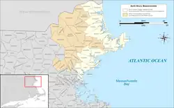 Map of the North Shore region of Massachusetts highlighted in yellow based on the region defined by the Massachusetts Office of Coastal Zone Management, with areas sometimes included in the region on other lists highlighted in light brown