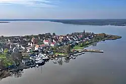Aerial view of the town center and Nowe Warpno Bay