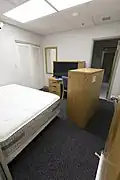 Astronauts sleep prior to launch day in dormitories in the Operations and Checkout Building. In this case a bedroom is undergoing renovations.