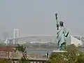 Replica Statue of Liberty with the Rainbow Bridge