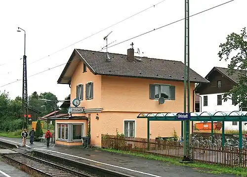 Two-story building with gabled roof