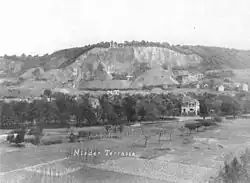 Historic photo, the place where the grave is found is marked by an arrow