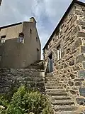 The building's forestair, pictured in 2024
