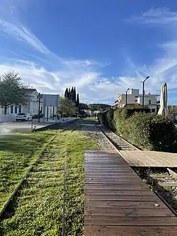Platform and tracks at Olympia Railway Station.