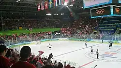 Arena interior and in-game Olympic hockey action