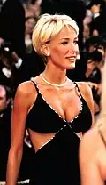 Blond woman in black dress