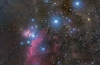 Orion's Belt, with the orange 31 Orionis towards the west (right)