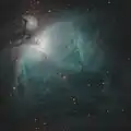 A false color 4-panel mosaic of the Orion Nebula, with near infrared data in the red channel and H-alpha data in the green and blue channels, taken with an 8" f/8 Ritchey–Chrétien telescope and monochrome camera with filters.