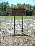 Ortona Indian Mound Park signage noting park was acquired and developed by Glades County, Florida with the assistance of the Florida Department of Natural Resources and the Florida Recreation Development Assistance Program