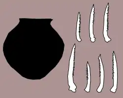 Image 20Carved catfish bones, and jar discovered in Maadi (from Prehistoric Egypt)