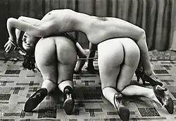 Three nude women, featuring bondage