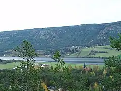 View of the village of Otnes and the lake Lomnessjøen
