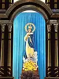 The Our Lady of the Immaculate Conception of Batanes perched on the cathedral's main retablo