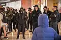 Plainclothes police in New Town Plaza on 24 December 2019