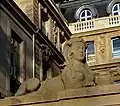 One of the sphinxes above the door