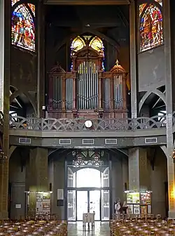 The piple organ located above the portal