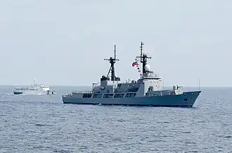 The Philippine Coast Guard vessel BRP EDSA II (SARV-002) and the Philippine Navy offshore patrol vessel BRP Gregorio del Pilar (PS-15) steam in formation during Cooperation Afloat Readiness and Training (CARAT) Philippines 2013