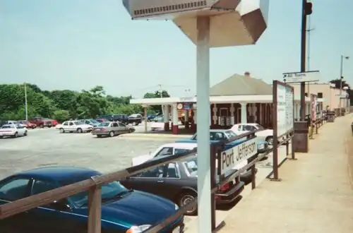 Parking lot and station building, as seen in 1999.