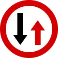 B-31 "priority for oncoming drivers" (one has to yield to oncoming drivers[3])