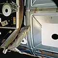 PMA-3's location on the nadir port of Node 1 Unity shows the tight fit between a berthed module and the deployed M/D Petal.[6]